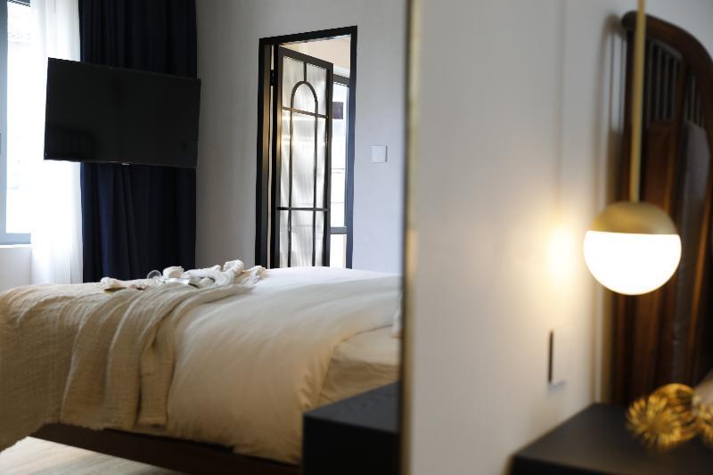 Gatsby Athens Hotel ภายนอก รูปภาพ A room at the hotel